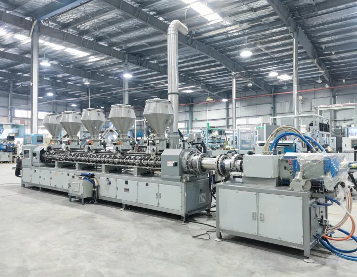 Twin-screw compounding line with feeders and pelletizer used as a trial discussion image, not a named factory